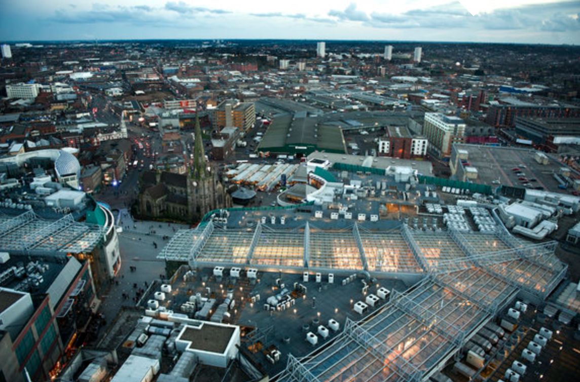 <strong>Evening view of the Bullring, St Martin's Church and Digbeth/Eastside in the background from top of The Rotunda in Birmingham</strong>