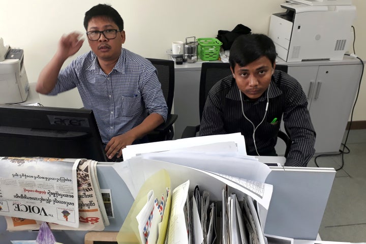 The two journalists, seen at the Reuters office in Yangon in 2017, were working on an investigation into the killing of