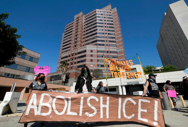 People protest in front of an ICE detention center in downtown Los Angeles on July 2.&nbsp;ICE has been infamous for controve