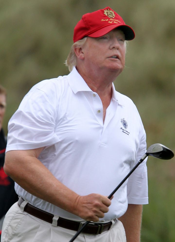 US President Donald Trump playing golf 