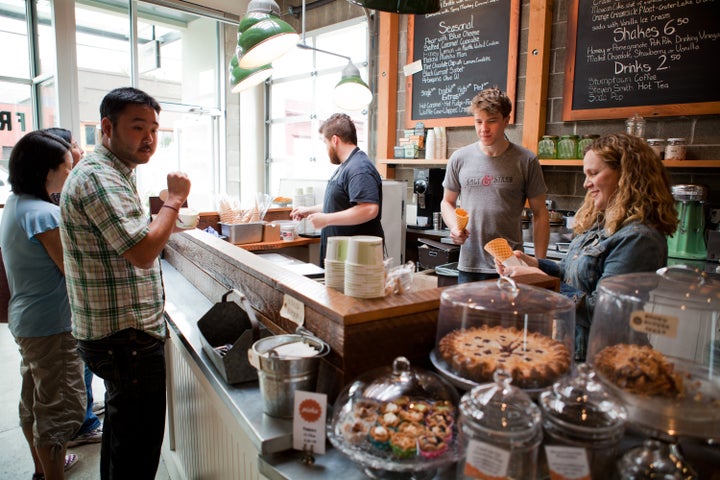 Guests line up at a Salt & Straw scoop shop in Portland, Oregon.