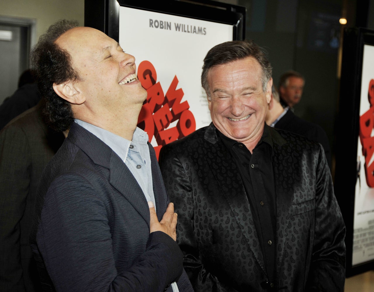 Actors Billy Crystal (left) and Robin Williams at the premiere of Magnolia Pictures' "World's Greatest Dad" on Aug. 13, 2009, in Los Angeles.