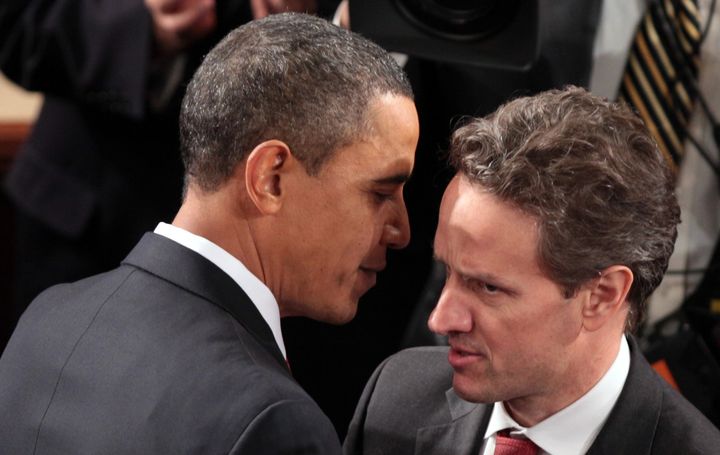 President Barack Obama greets Treasury Secretary Timothy Geithner