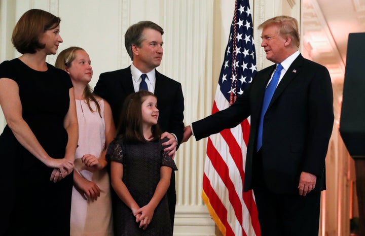 Kavanaugh with his family and Trump at the White House after the announcement. In light of Kavanaugh’s rulings, some of