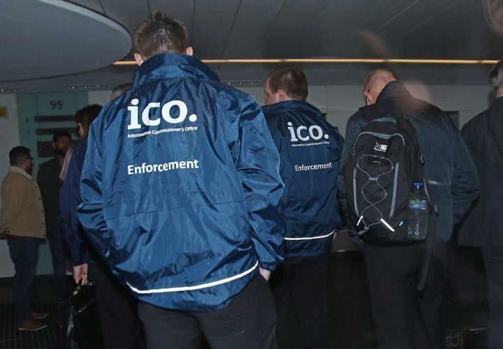 Enforcement officers working for the Information Commissioner's Office entering the offices of Cambridge Analytica in central London after a High Court judge granted a search warrant