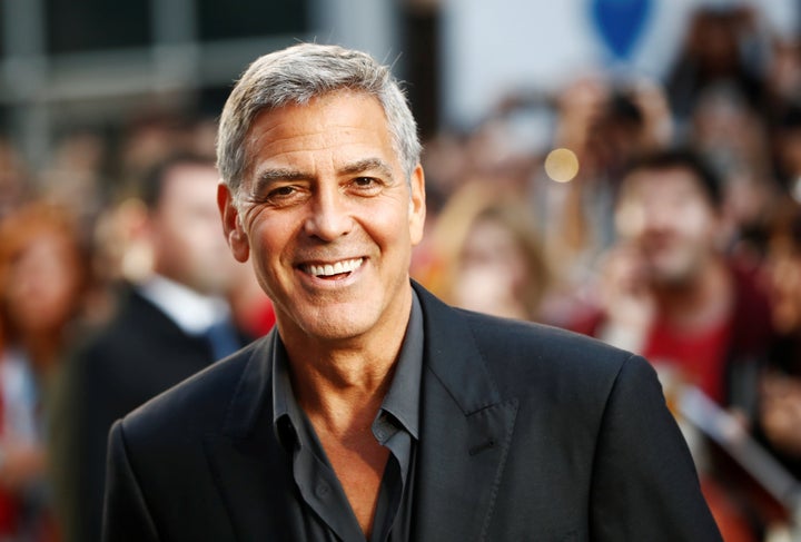 George Clooney managed to walk away from a scary scooter crash on the island of Sardinia.