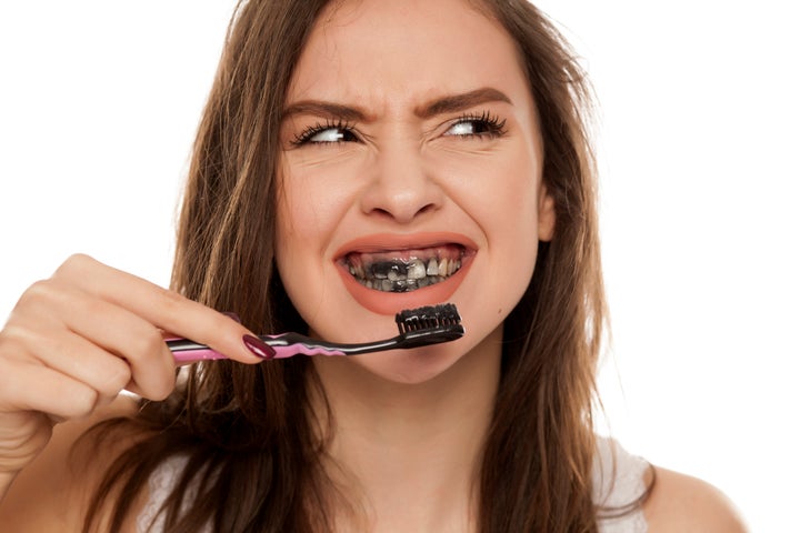 Is Charcoal Toothpaste Safe? Dentists Explain The Risks | HuffPost Life Is Charcoal Toothpaste Safe? Dentists Explain The Risks | HuffPost Life