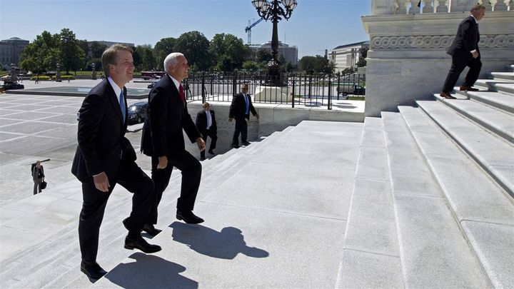 Supreme Court nominee Brett Kavanaugh arrives on Capitol Hill with Vice President Mike Pence (right) to meet with senators who will decide on his confirmation. His vote could be pivotal in a case reflecting states’ rights. 