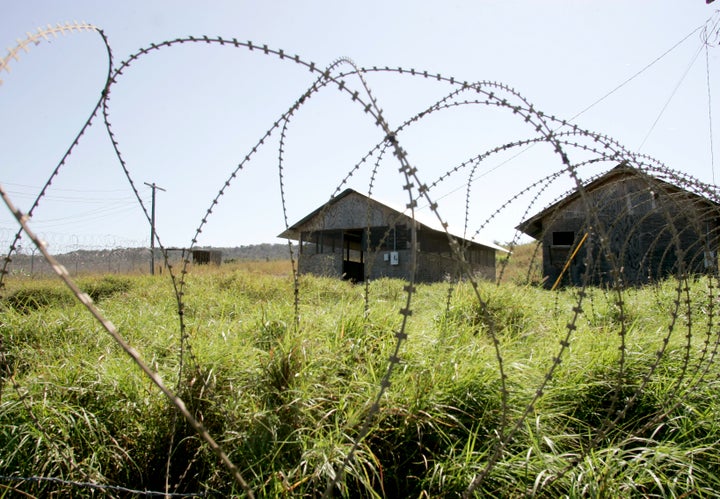 Buildings stand empty and overgrown at the Guantanamo Bay camp now that the prisoner population is down to 40.