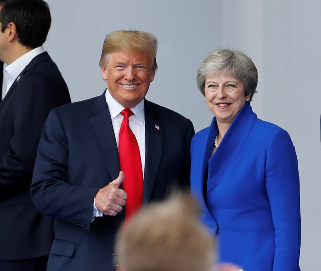 President Donald Trump and British Prime Minister Theresa May at the NATO Summit in Brussels on Wednesday.