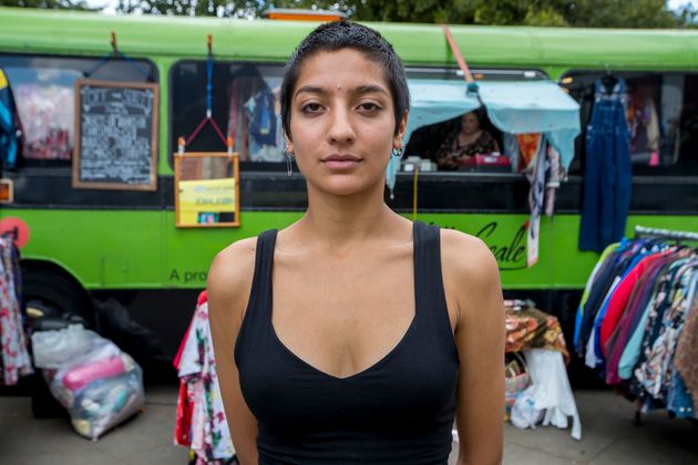 Saffiyah Khan in front of the Off The Scale vintage bus