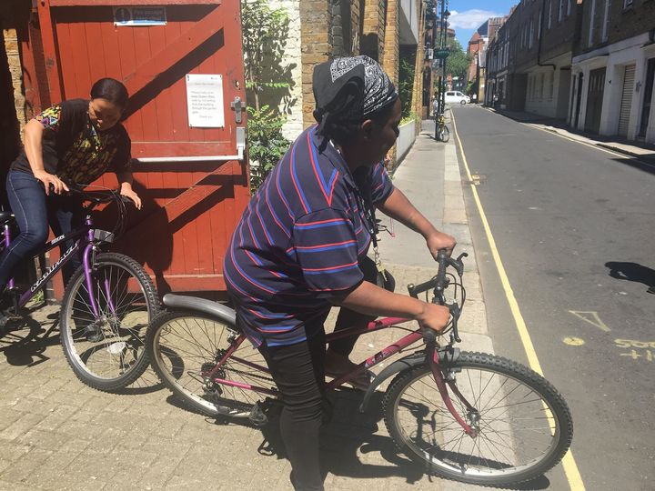 Patience and Charlene getting ready to go out on their bikes. 