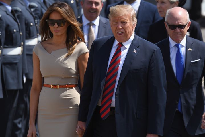 The US president and first lady arrive at Stansted Airport.