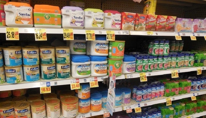  A variety of infant formula on display at a supermarket. 