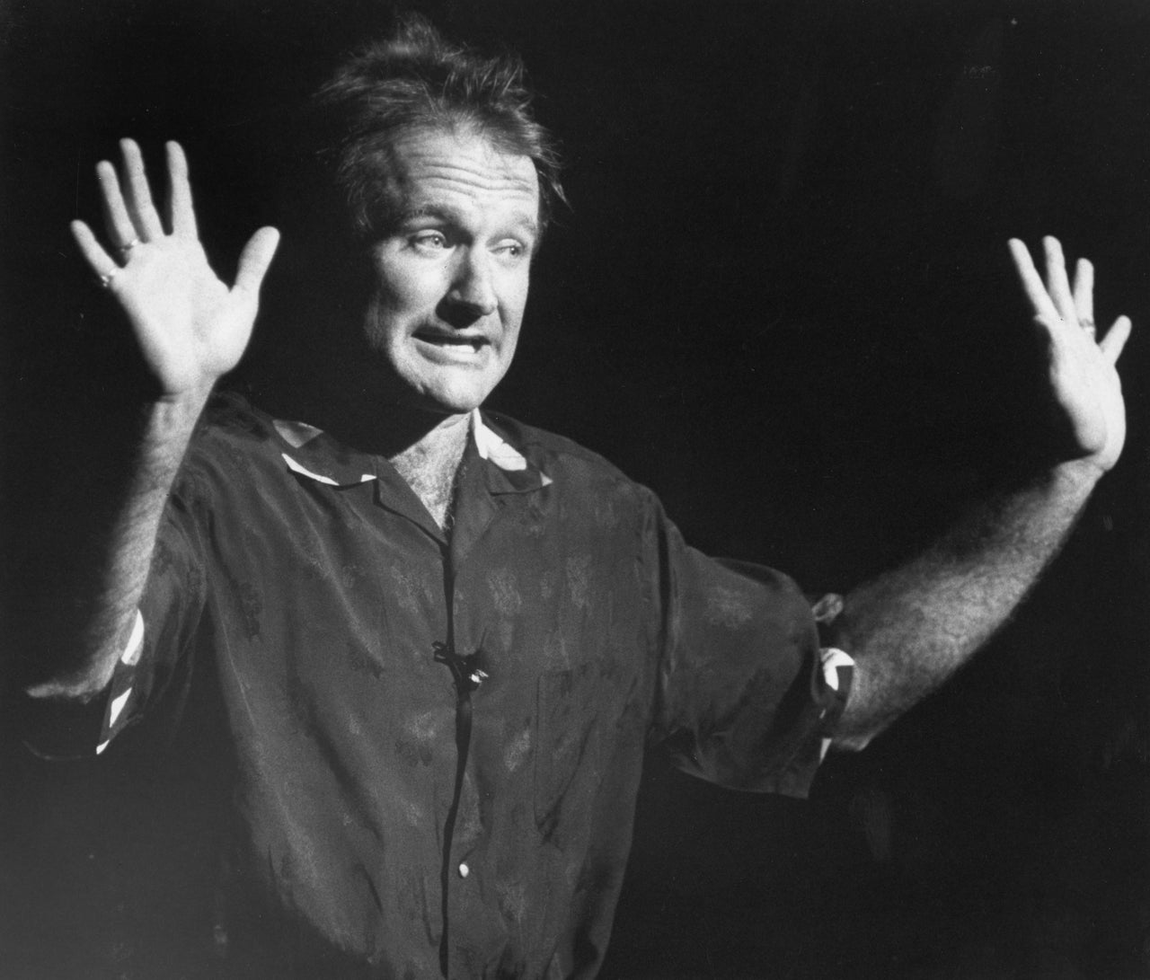 Robin Williams performs stand-up comedy during a fundraiser to benefit John Kerry's Senate campaign at the Wang Center in Boston on Oct. 23, 1990.