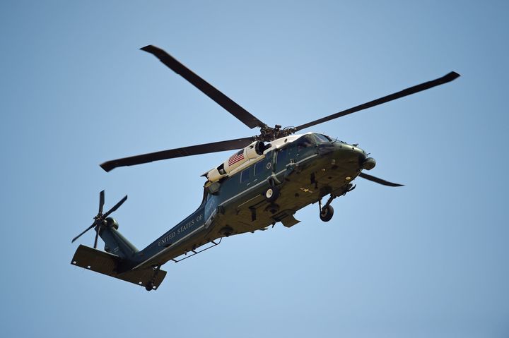 A helicopter of the US Marine Corps comes into land at the residence of the US Ambassador in London's Regent's Park.