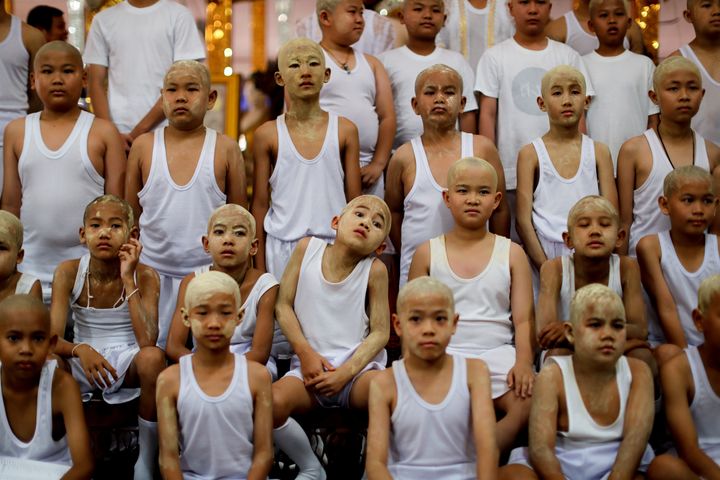 Boys await an initiation ceremony as Buddhist novices in Mae Hong Son, Thailand, in April. It’s common for young boys in Thailand to temporarily join a local monastery.
