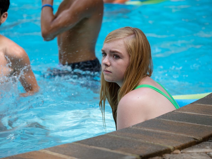 Kayla having a less-than-fun time at a supposed-to-be fun pool party