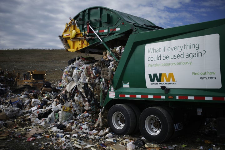 A garbage truck dumps trash at a landfill in Ferris, Texas. Organic material makes up most of the waste sent to landfills, according to the Environmental Protection Agency.