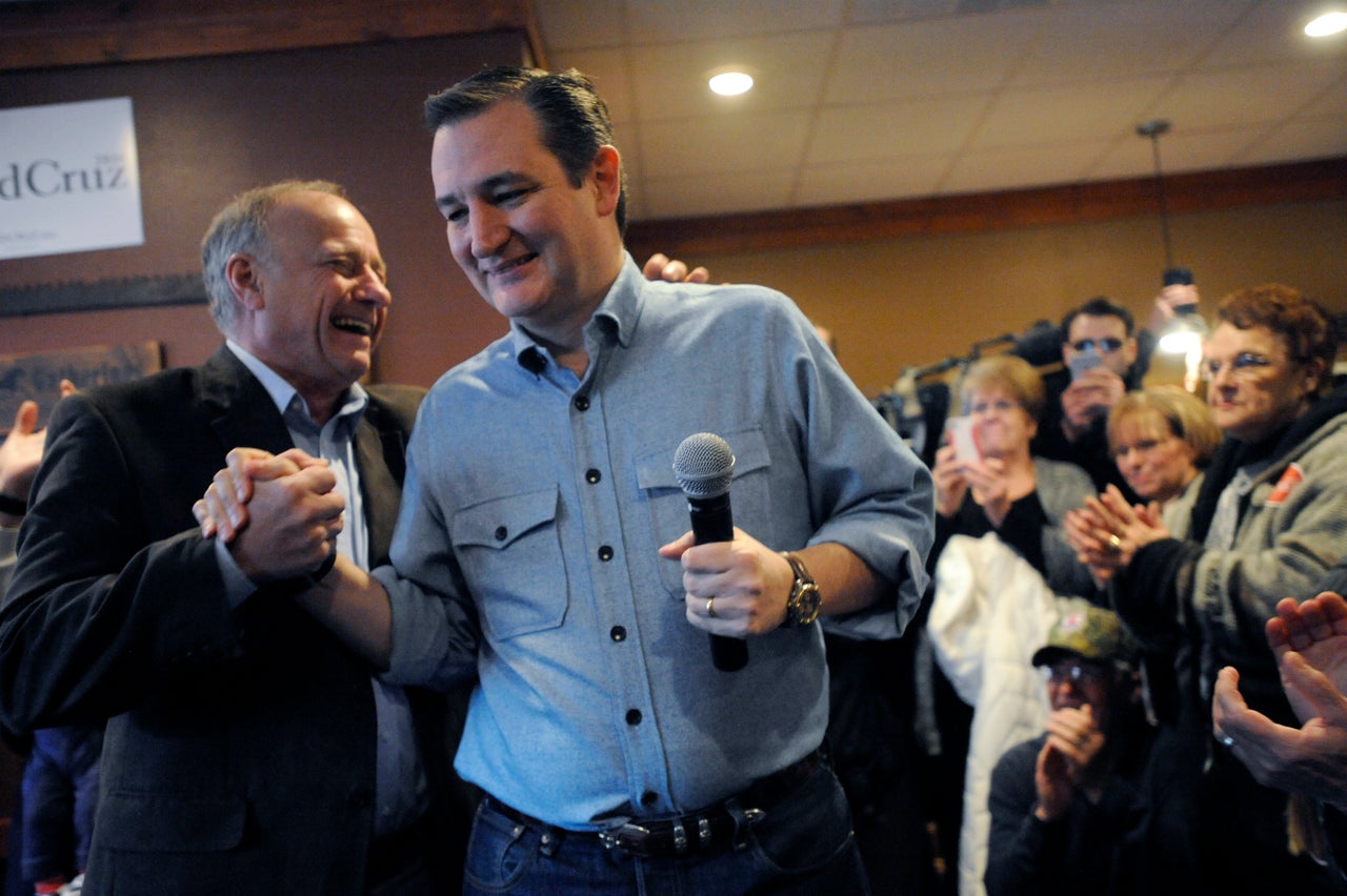 Sen. Ted Cruz, then a Republican presidential candidate, shakes hands with King at a campaign stop in Iowa on January 7, 2016. 