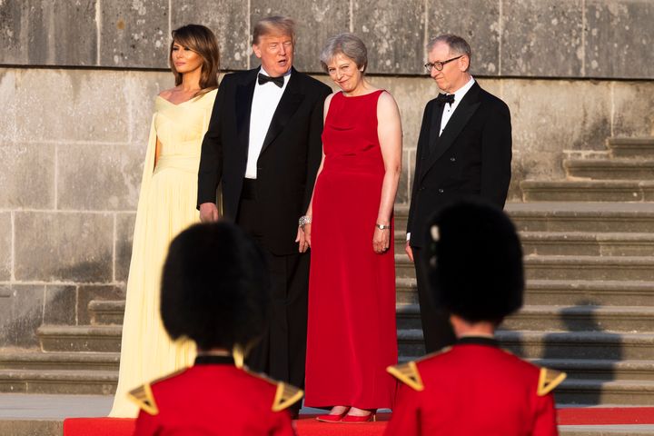 Donald Trump and his wife Melania stand with Prime Minister Theresa May and her husband Philip May at Blenheim Palace, Oxfordshire, where Mrs May hosted a dinner as part of their visit to the UK