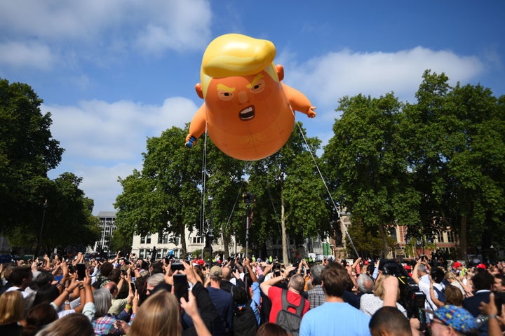 The blimp rises in Parliament Square.