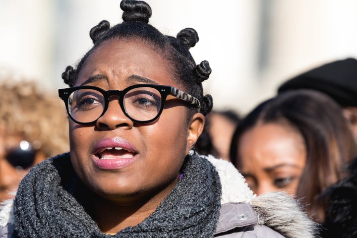 Charlene Carruthers, founding national director of the Black Youth Project 100, speaks at a news conference at the U.S. Capitol on March 15, 2018.