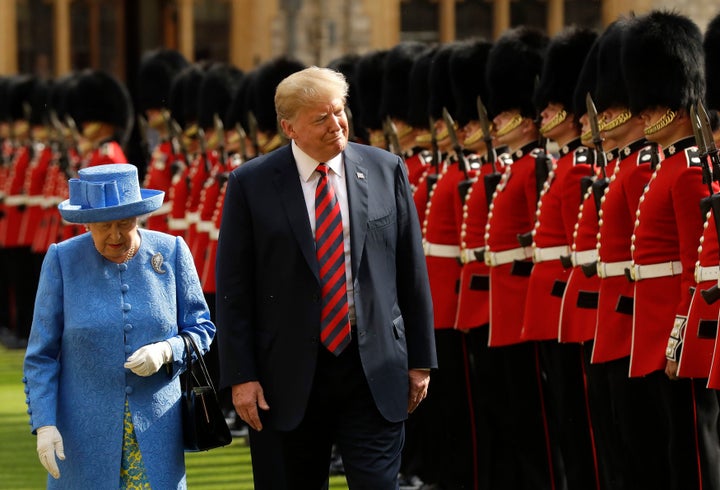 President Donald Trump and Queen Elizabeth II inspect a Guard of Honour, formed of the Coldstream Guards, at Windsor Castle on July 13. 