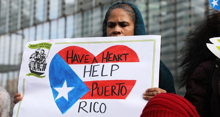 Puerto Rican activists and others participate in a protest outside of New York City's FEMA office on Feb. 20.