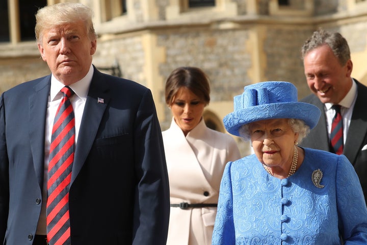 President Trump, Queen Elizabeth II, first lady Melania Trump and Lieutenant Colonel Sir Andrew Ford walk together to le