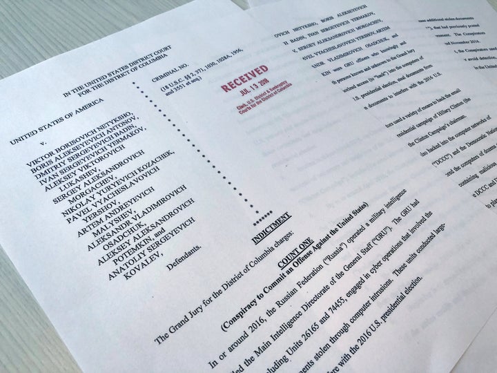 A copy of the grand jury indictment against 12 Russian intelligence officers is seen after being filed by prosecutors for special counsel Robert Mueller's Russia investigation.