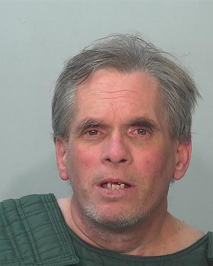 John Miller after his arrest by police on July 15. Authorities used a public DNA database to identify him as a suspect. 