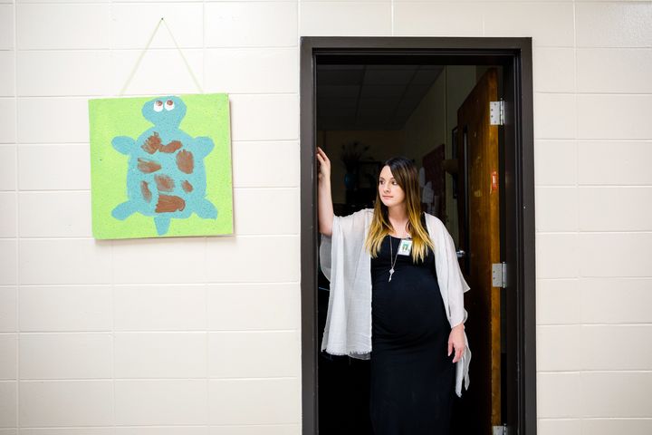 Samantha Boatwright, a mental health worker who offers therapy and counseling to elementary school-aged kids in Thomasville, Georgia, stands outside her office.
