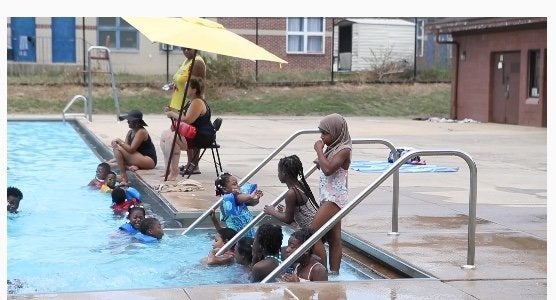 Children swim at the Foster Brown public pool in Wilmington, July 12. Mayor Mike Purzycki said in a statement that city officials at the pool “used poor judgement” regarding the children’s attire.