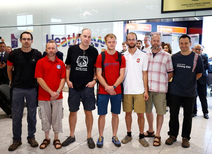The British cave divers involved in freeing the young football team from a Thai cave - Rick Stanton, Chris Jewell, Connor Roe, Josh Bratchley, Jim Warny, Mike Clayton and Gary Mitchell - after arriving back at Heathrow Airport