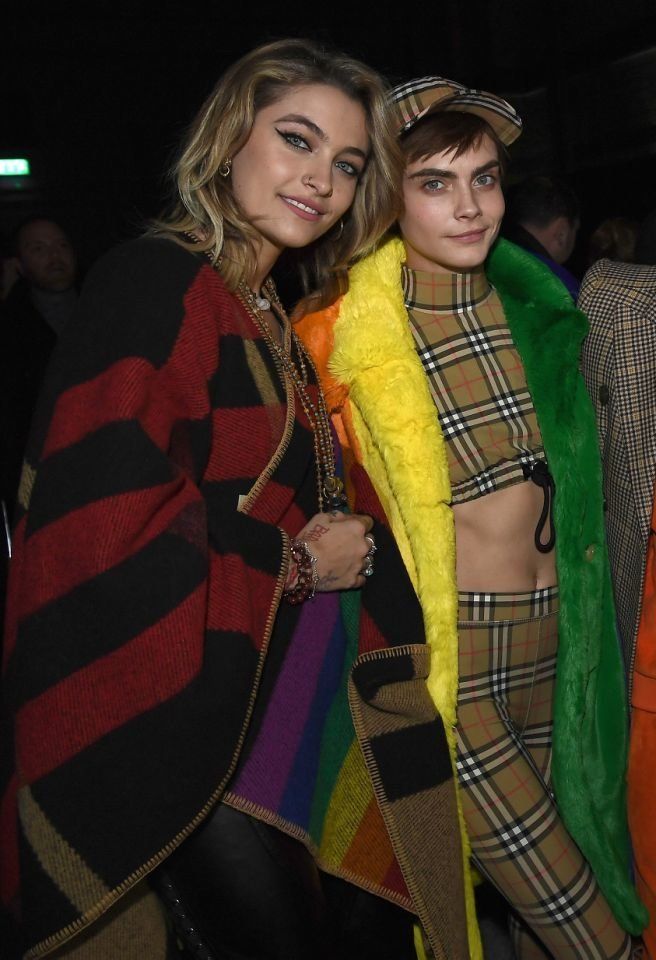 Paris Jackson and Cara Delevingne at the Burberry February 2018 show during London Fashion Week. 