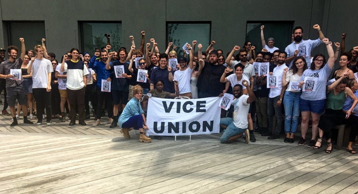 Vice employees gather on the rooftop of the company's Brooklyn headquarters on Tuesday to discuss next steps.