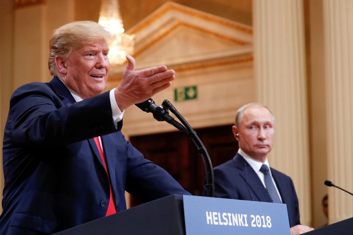 U.S. President Donald Trump gestures during a joint news conference with Russia's President Vladimir Putin after their meeting in Helsinki, Finland