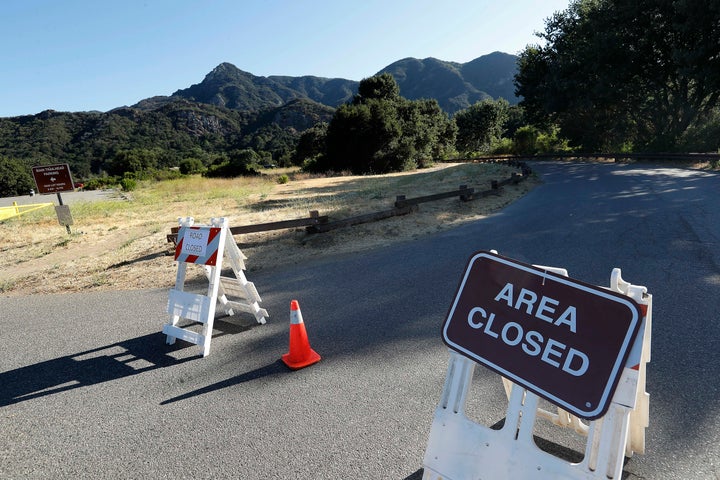 A road leading to a camping area at Malibu Creek State Park is closed.