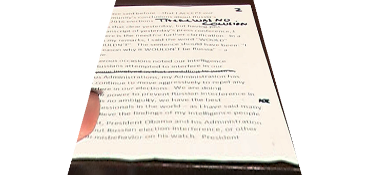 A close-up of Trump’s “There was no colusion” note.