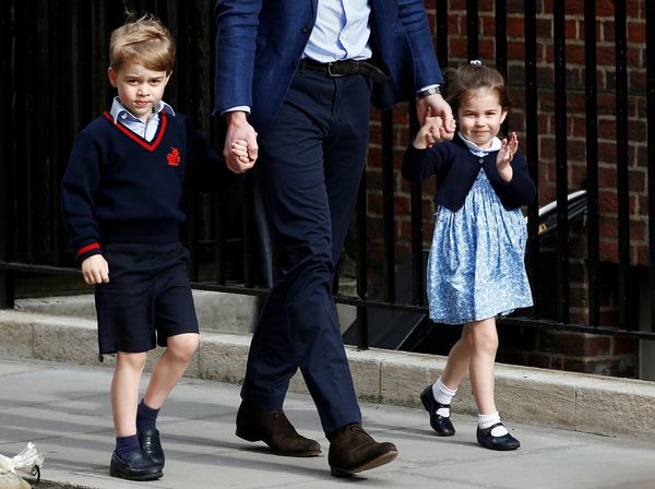  Prince George and Princess Charlotte arrive at the Lindo Wing with their father, Prince William, after their mother gave 