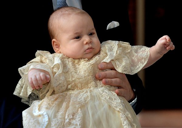 Prince William carries Prince George as they arrive for his christening at St James's Palace in London on&nbsp;Oct. 23, 2013.