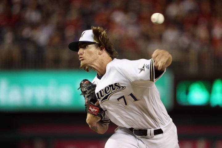 Josh Hader pitches in the eighth inning of the All-Star Game. He later apologized for hate-filled tweets from his past that resurfaced.