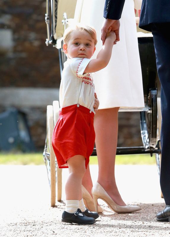 July 2015: Prince George arrives at his sister Princess Charlotte's christening and is momentarily surprised by the paps.