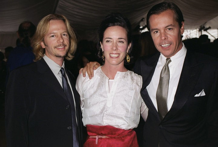 Kate Spade is flanked by her husband, Andy Spade (right) and brother-in-law David Spade at the American Fashion Awards in New York in 2000.