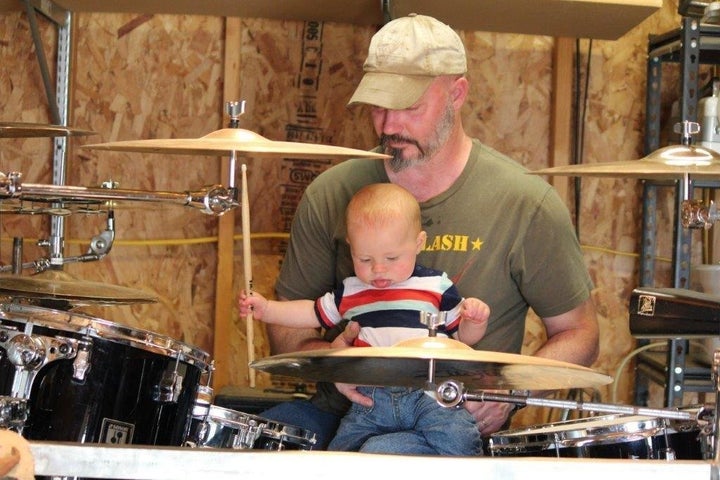 Bouchér with his grandchild.