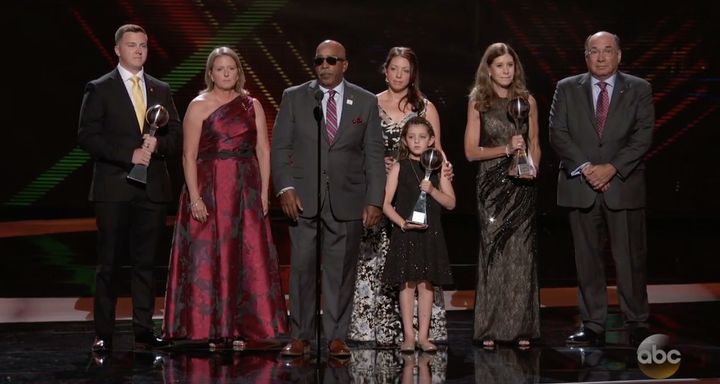 The families of Scott Beigel, Aaron Feis and Chris Hixon jointly accepted the award for Best Coach at the ESPYs.