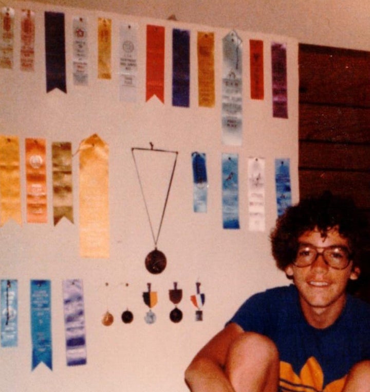 Steve Kissing in 1978 with some of the ribbons, medals and trophies he won for long-distance running, a sport he took up in an effort to beat the devil.