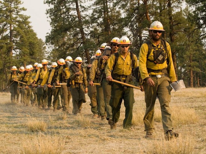 Wildland firefighters, like this crew heading into New Mexico’s Gila National Forest, in 2012, are equipped and operate differently from urban firefighters. USFS Gila National Forest, CC BY-SA