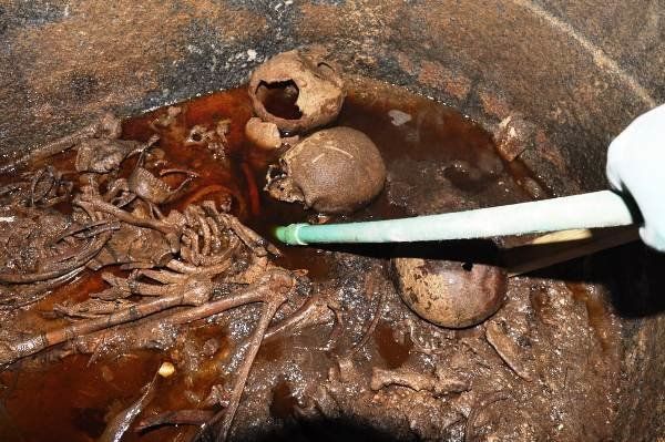 Authorities said they discovered three skeletons inside the sarcophagus.